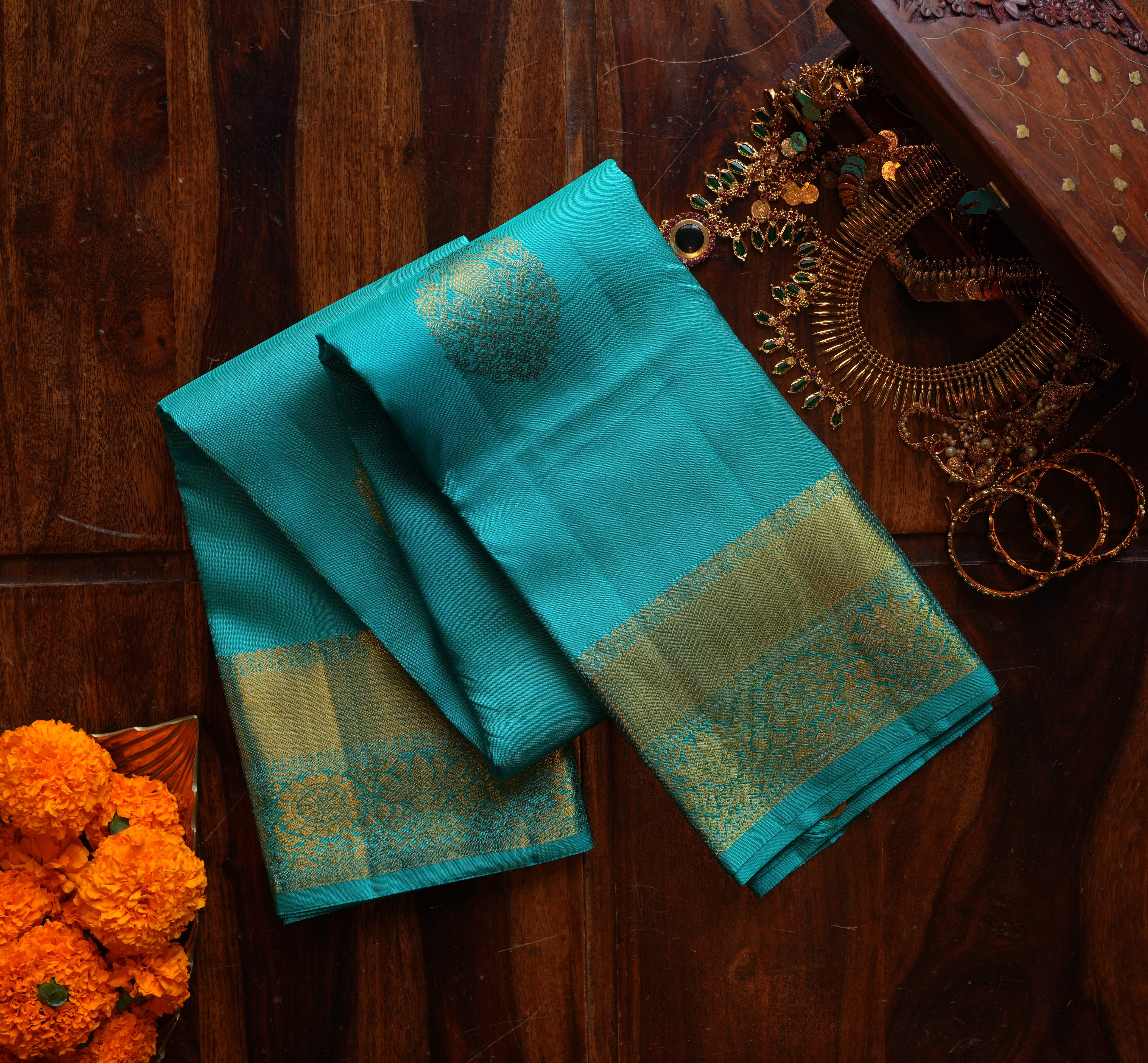 Pure Kanchipuram Silk Saree in Elegant Teal Green with Traditional Zari Border